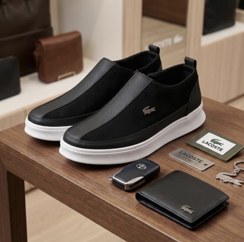 black Lacoste slip-on sneakers